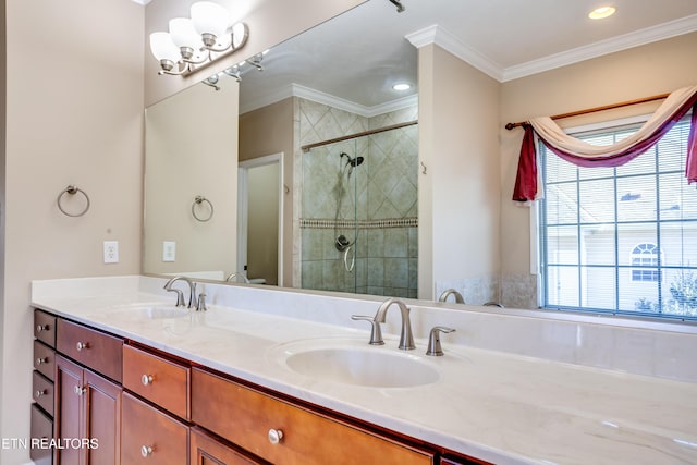 bathroom featuring crown molding, vanity, and a shower with door