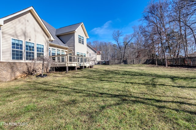 view of yard with a deck