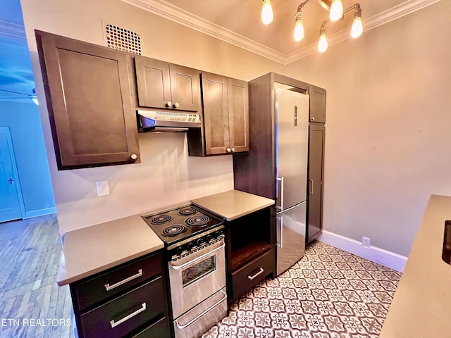 kitchen featuring ornamental molding, appliances with stainless steel finishes, and dark brown cabinets