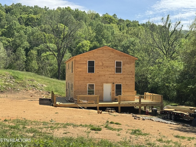 157 Greasy Cove Rd, Cosby, TN 37722 - back of property with a wooded view and a deck