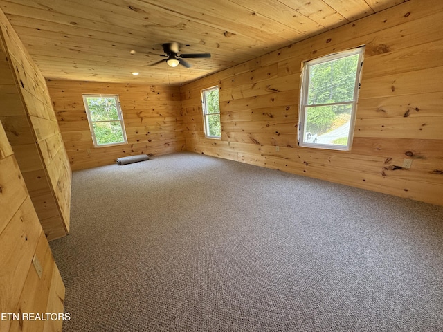 157 Greasy Cove Rd, Cosby, TN 37722 - carpeted spare room with wooden ceiling, wooden walls, and ceiling fan