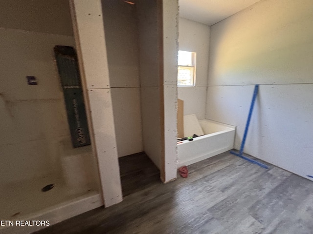 157 Greasy Cove Rd, Cosby, TN 37722 - full bathroom featuring wood finished floors and a bath