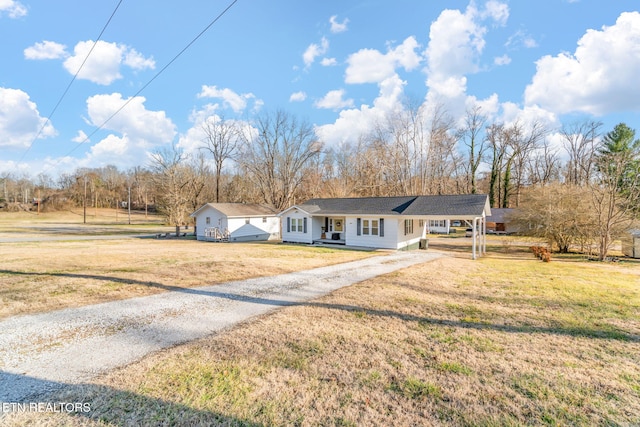 single story home featuring a front yard