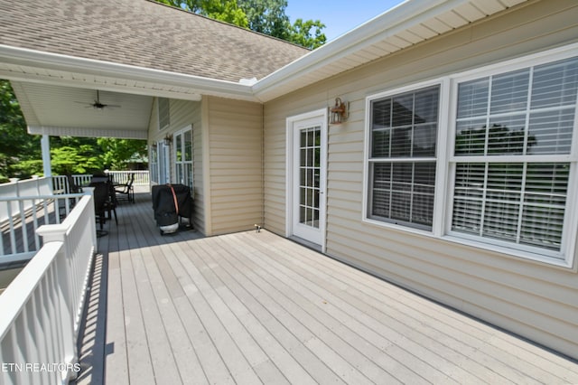 wooden terrace with ceiling fan