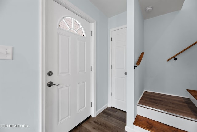 foyer with dark hardwood / wood-style flooring