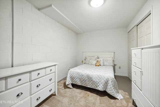 bedroom featuring light colored carpet