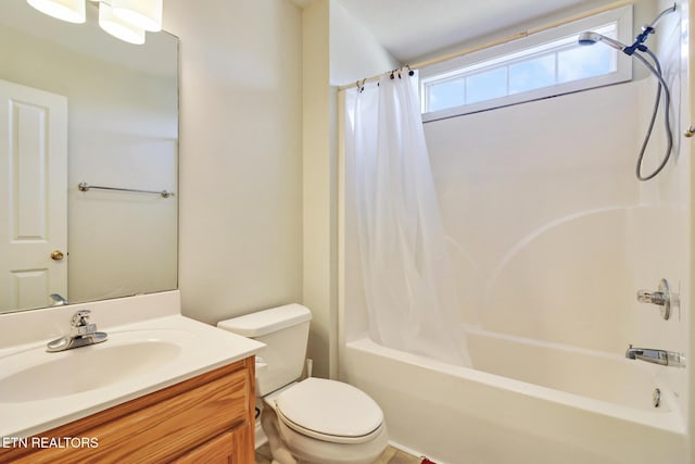 full bathroom featuring vanity, shower / tub combo, and toilet