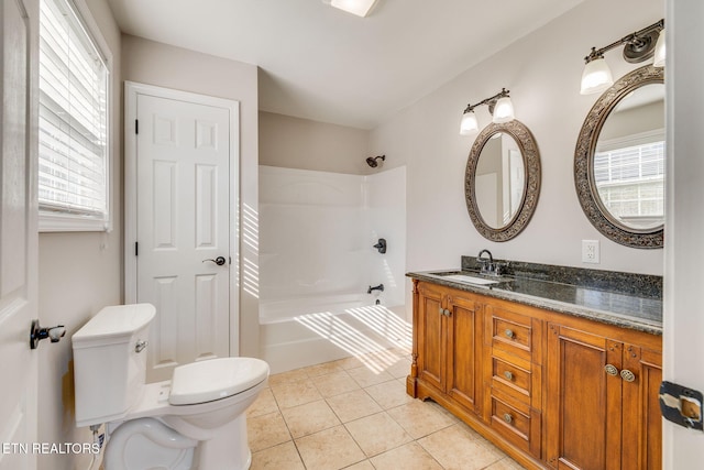 full bathroom with tile patterned floors, a wealth of natural light, shower / bath combination, and toilet