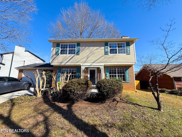 view of front of home featuring a front lawn