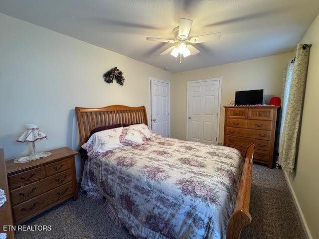 carpeted bedroom with ceiling fan