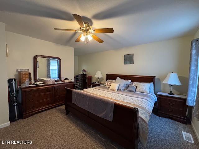 bedroom with carpet flooring and ceiling fan