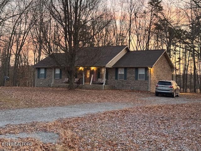 single story home with a garage