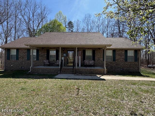 1039 S Ln, Grimsley, TN 38565 - ranch-style home featuring brick siding, crawl space, and a front lawn
