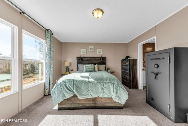 bedroom featuring light colored carpet