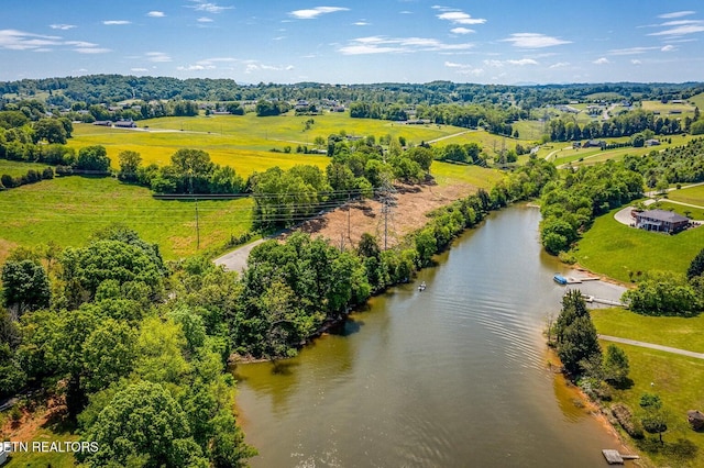 bird's eye view with a rural view and a water view