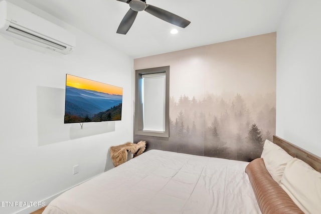 bedroom featuring an AC wall unit and ceiling fan