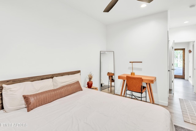 bedroom featuring ceiling fan and light hardwood / wood-style floors