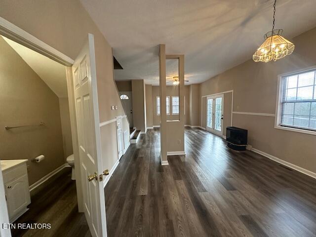 interior space featuring dark hardwood / wood-style flooring and a wealth of natural light