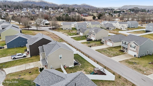 drone / aerial view featuring a mountain view