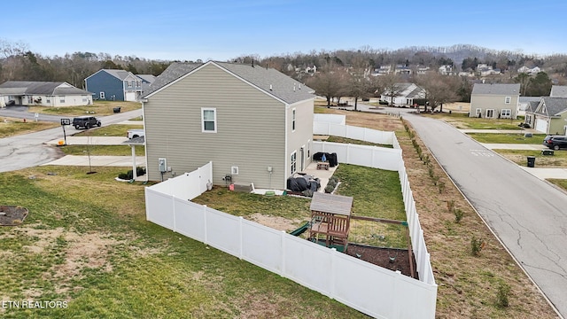 view of side of property featuring a playground