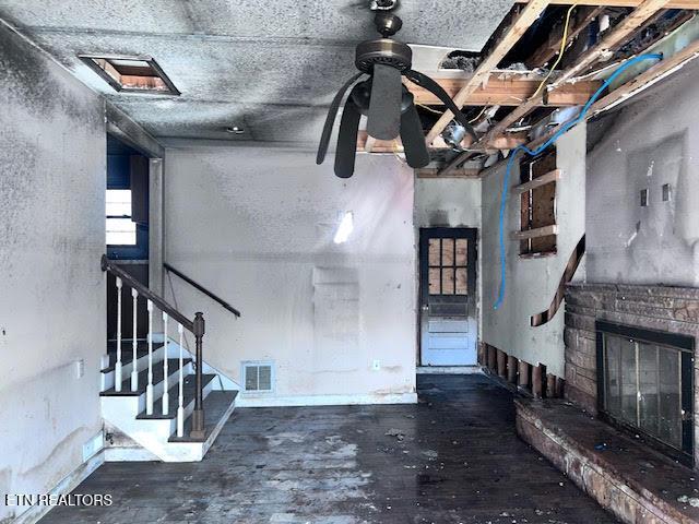 interior space featuring dark wood-type flooring