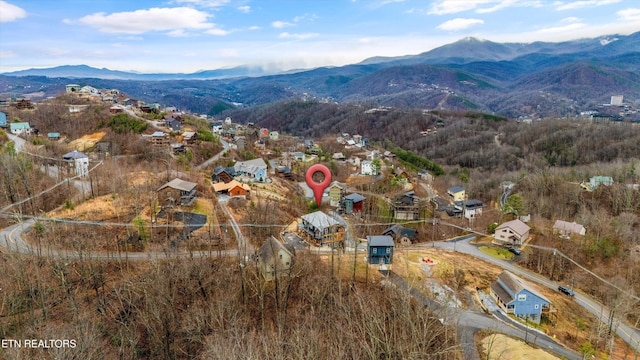 aerial view featuring a residential view and a mountain view