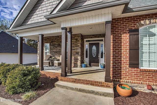 property entrance with covered porch