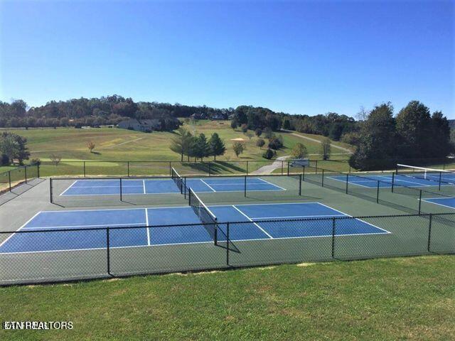 565 Rarity Bay Pkwy Unit 101-A, Vonore, TN 37885 - view of tennis court with fence