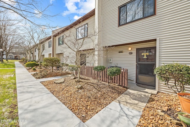 view of exterior entry featuring a residential view