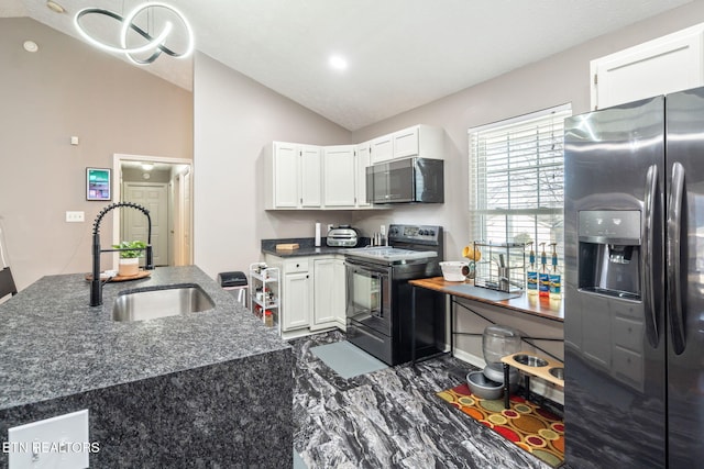 kitchen with black range with electric stovetop, sink, white cabinets, and stainless steel fridge with ice dispenser