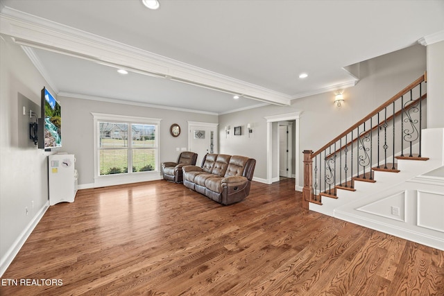 living room with crown molding and wood-type flooring