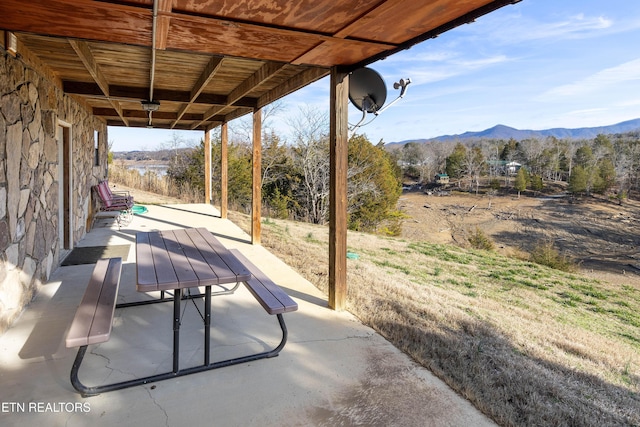 view of patio / terrace with a mountain view