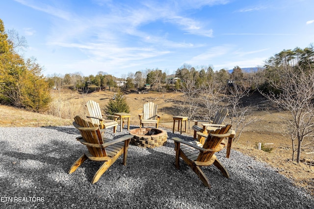 view of patio featuring a fire pit