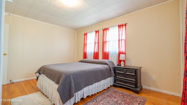 bedroom with light hardwood / wood-style floors