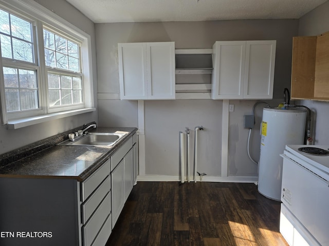 kitchen with white range with electric stovetop, water heater, white cabinetry, sink, and dark hardwood / wood-style flooring