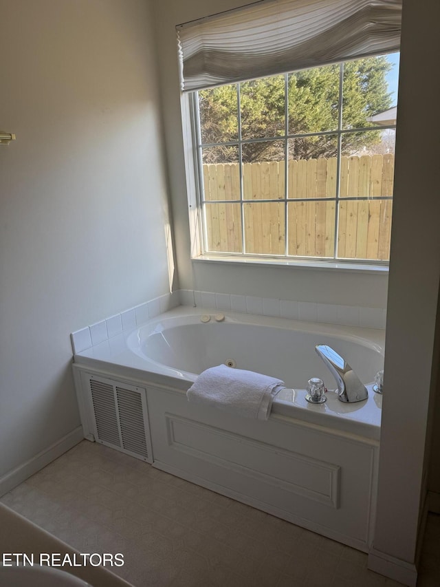 bathroom with a bathing tub