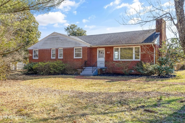 ranch-style house with a front lawn