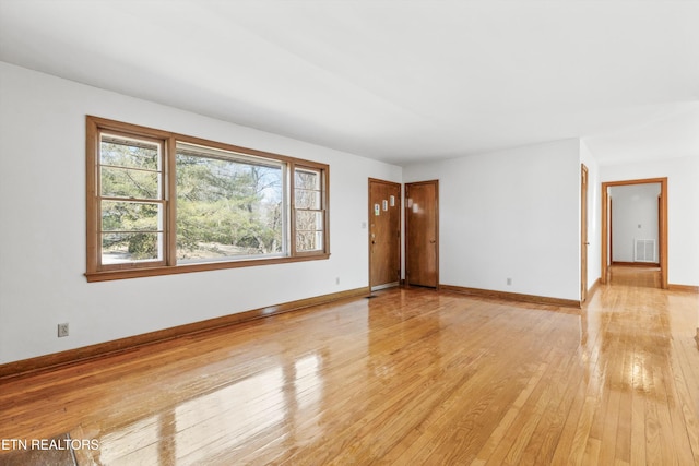 empty room featuring light wood-type flooring