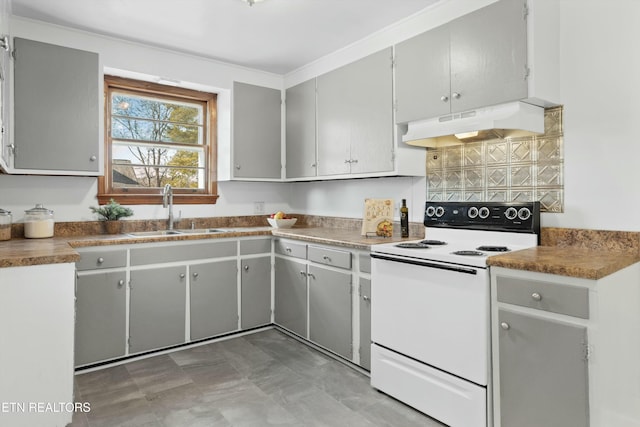 kitchen featuring electric stove, gray cabinets, and sink