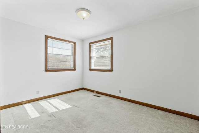 view of carpeted spare room