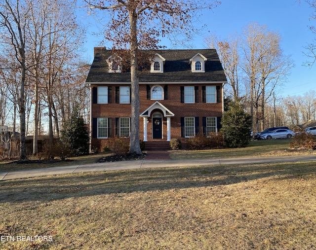 colonial house with a front yard