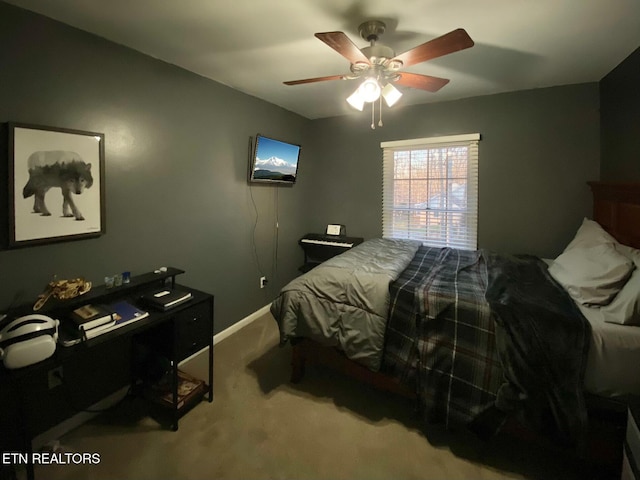 bedroom featuring carpet floors, ceiling fan, and baseboards