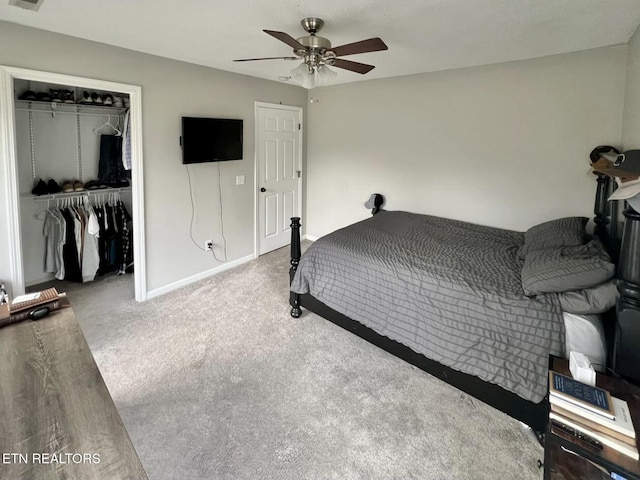 bedroom featuring a closet, carpet, a ceiling fan, and baseboards