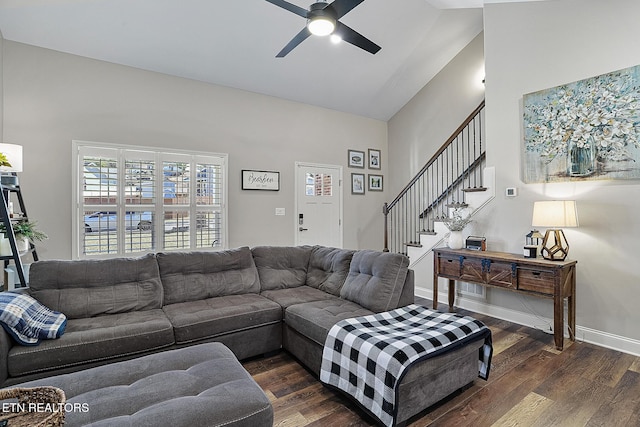 living room featuring high vaulted ceiling, dark hardwood / wood-style floors, and ceiling fan