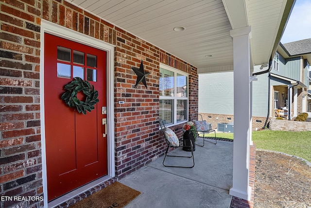 doorway to property featuring a porch