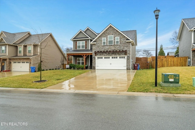 craftsman-style house featuring a garage and a front lawn