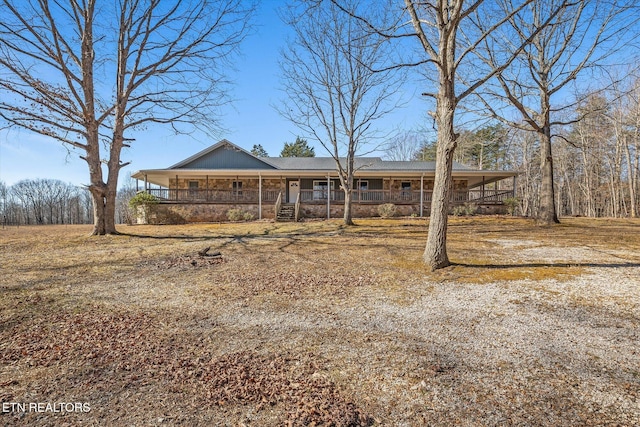 ranch-style home featuring covered porch