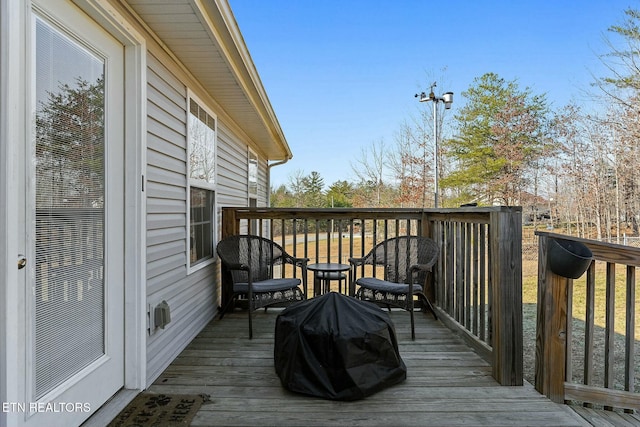 deck with area for grilling