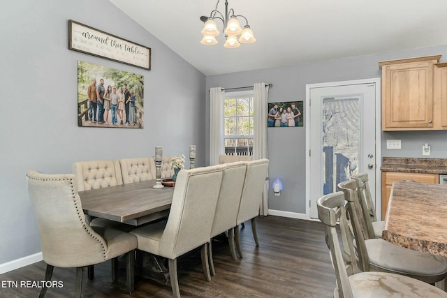 dining area with an inviting chandelier, dark hardwood / wood-style flooring, and vaulted ceiling