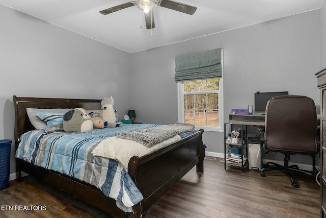 bedroom with dark wood-type flooring and ceiling fan